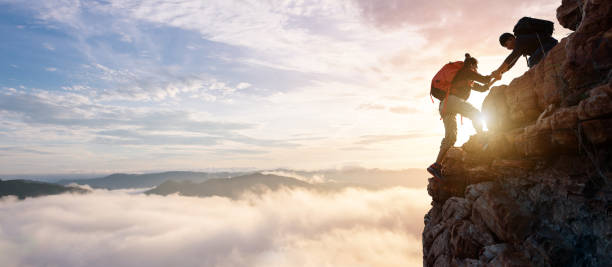 istock Group of happy hiker jumping on the hill 1498587102