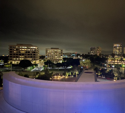 A shot of the city lights at night and the empty streets in Newport Beach, CA.