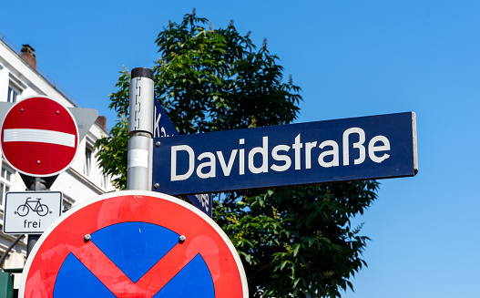 Low angle view of street name sign at Hamburg city