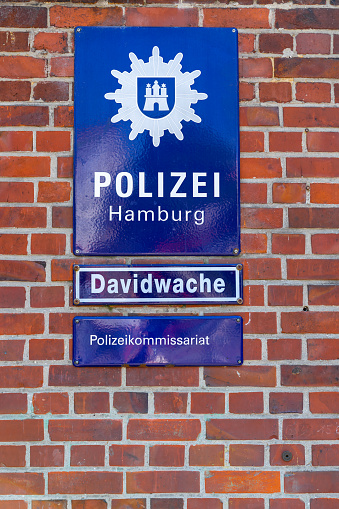 Famous police station sign on brick wall in Hamburg city, Davidwache