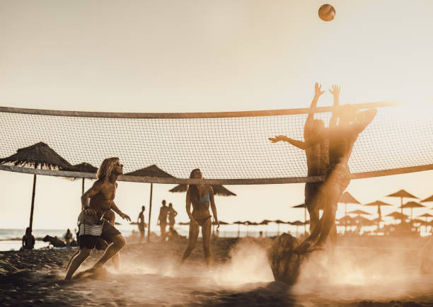 istock Beach volleyball at sunset! 1498604395