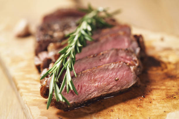 istock sliced rib eye steak on wood board 1498604995