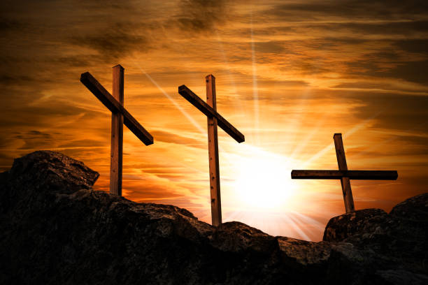 istock Three Religious Crosses Against a Dramatic Sky at Sunset 1498608597