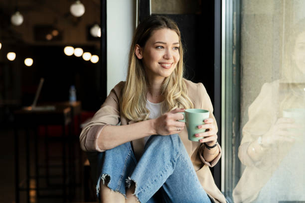 istock Young woman enjoy in fresh coffee. 1498608599