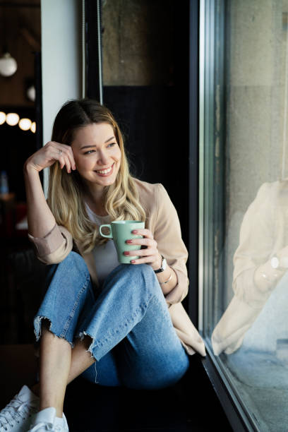 istock Young woman enjoy in fresh coffee. 1498608638