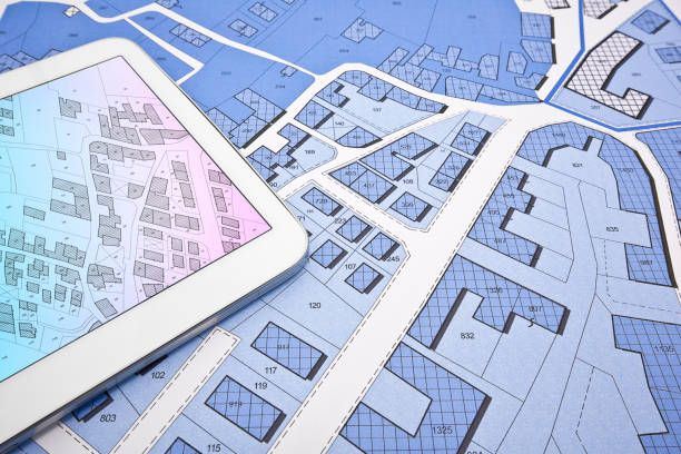 istock Buildings Permit concept with imaginary cadastral on digital tablet - building activity and construction industry with General Urban Plan 1498611831