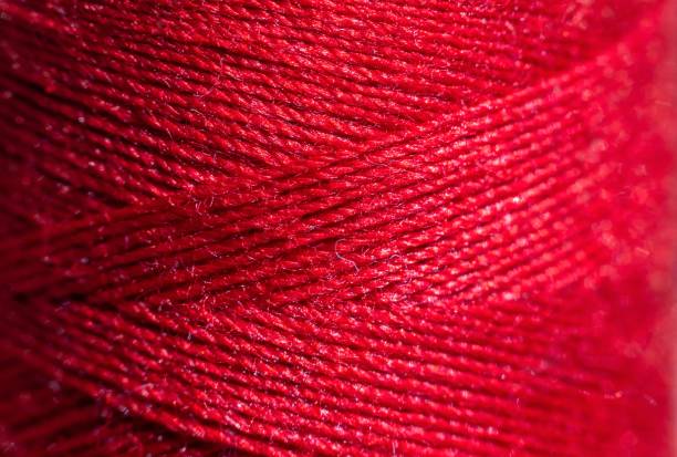istock Macro of Red Color Thread in Horizontal Orientation 1498616475