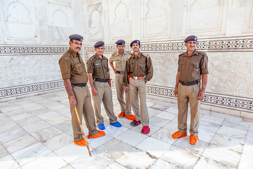 Agra, India - November 16, 2011: policemen in Uniform responsible for the safety at the Taj Mahal in Agra.