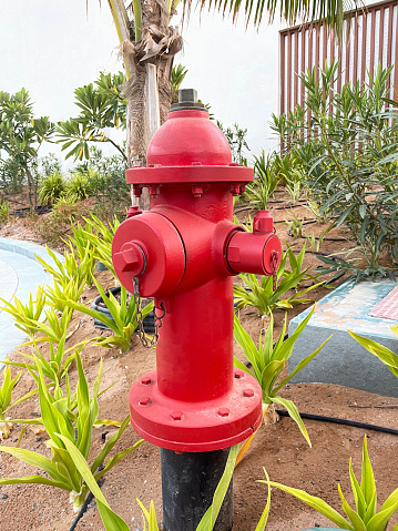 close up of a large red fire hydrant.