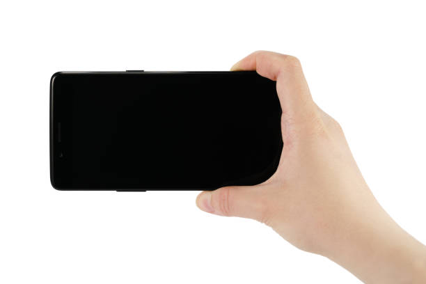 istock young female hand holding smartphone with black screen isolated on white 1498621322