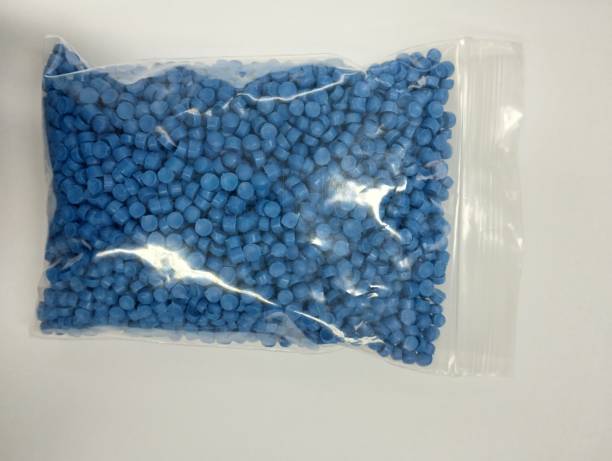 istock Blue of plastic polymer granules for background. 1498621667