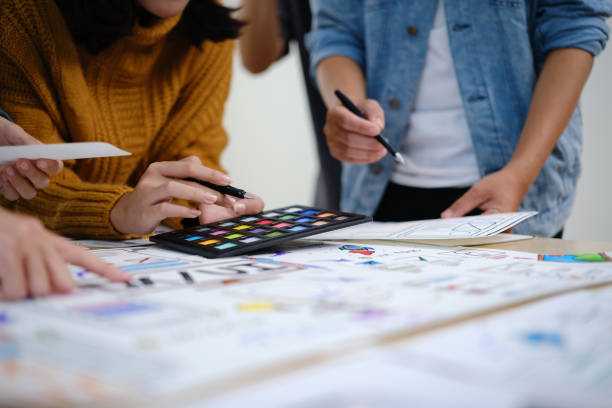 istock Diverse startup businesspeople discussing work, brainstorming, sharing ideas and solutions, negotiating on project at meeting. 1498623813