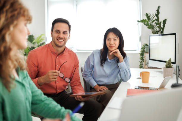 istock Colleagues working together at the office 1498624154