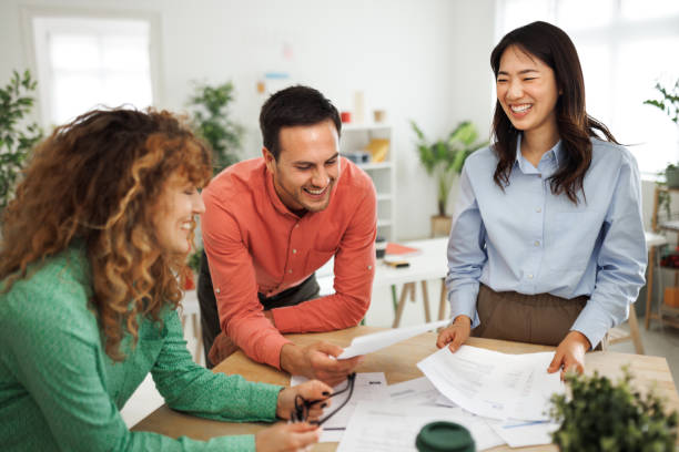 istock Colleagues brainstorming ideas at modern office 1498624276