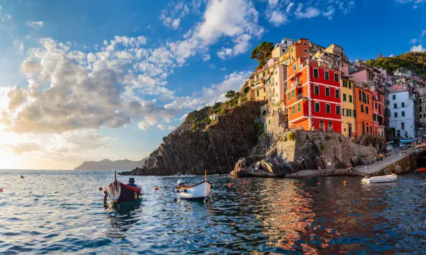 Riomaggiore in Cinque Terre, Italy at sunset. Popular tourist destination in Liguria coast.