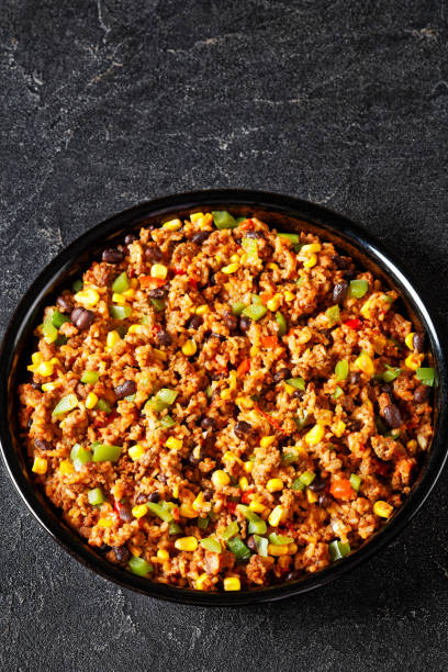 istock Mexican ground beef casserole with rice, beans 1498626762