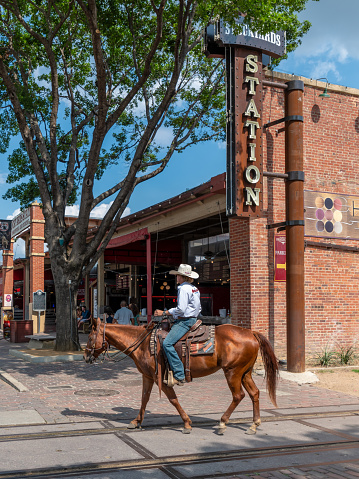 Fort Worth, Texas, USA. 31 May 2023. Man on horse back, in a cowboy hat, in Fort Worth, Texas