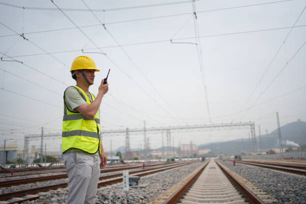 istock Railway worker holding a walkie-talkie 1498628691