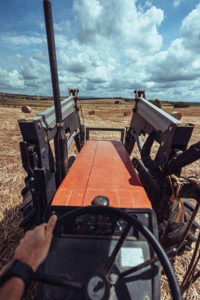 istock Agricultural activity in Italy: tractor at work in the field 1498631920