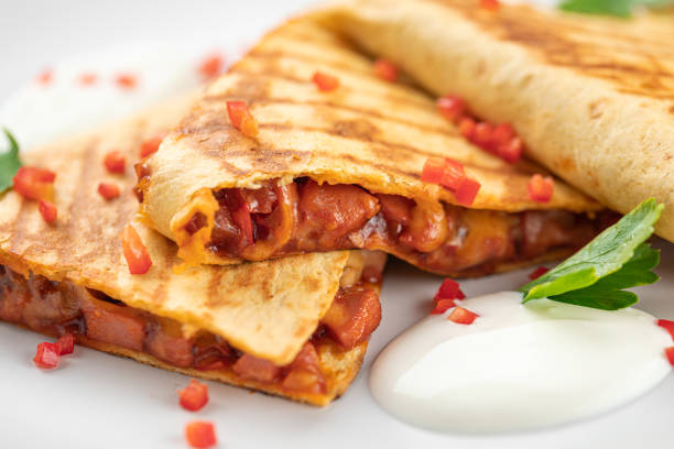 istock Portion of appetizing quesadilla wrap with chicken 1498632051