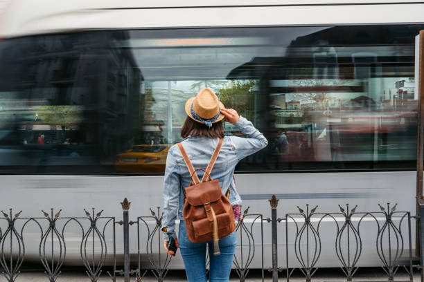 istock Young Woman Waiting For A Tram In Istanbul 1498634372