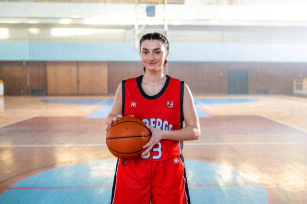istock Basketball player standing on court 1498634490