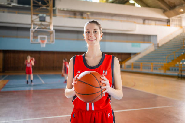 istock Basketball player standing on court 1498634518
