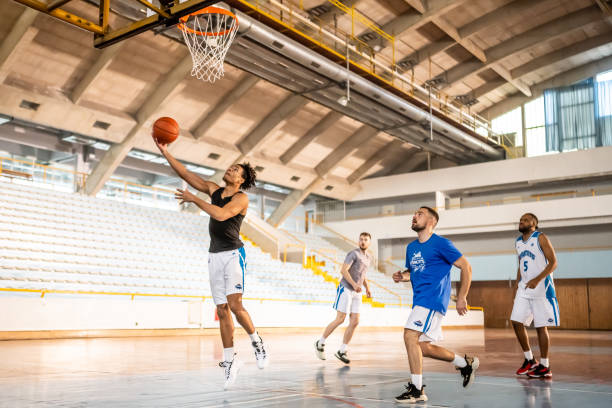 istock Male players playing basketball 1498634535