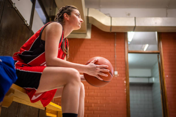 istock Basketball player holding ball 1498634547
