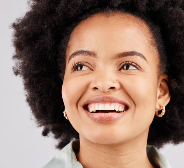 istock Smile, thinking and woman with ideas, decision and opportunity against a white studio background. Female model, ponder and person with happiness, thoughts and wonder with mindset, future and fantasy 1498637201