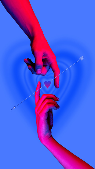 Love. Human hands touching Cupid's arrow over blue neon background. Concept of modern art, design for print, wallpapper, ad. Futurism