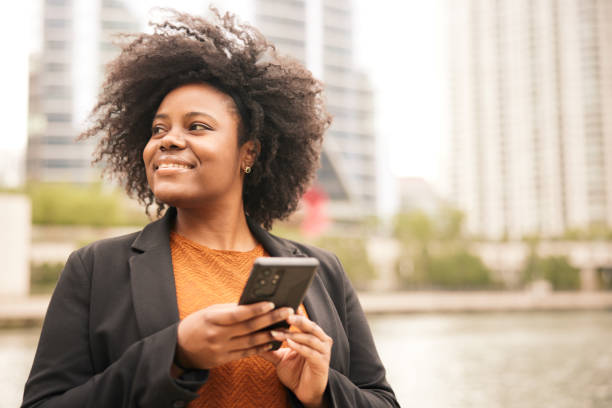 istock Digital Connectivity: Businesswoman Stay Connected on her Phone during Commute Home 1498638580