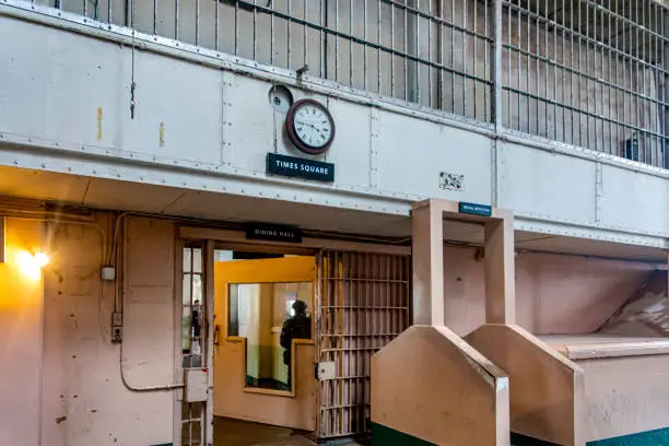 Photo of Clock in the dining room of the federal prison on Alcatraz Island in the middle of San Francisco, California, USA. Very famous prison that has appeared several times in movies.