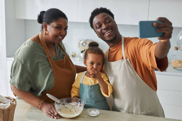 istock Family making selfie portrait on smartphone 1498642646