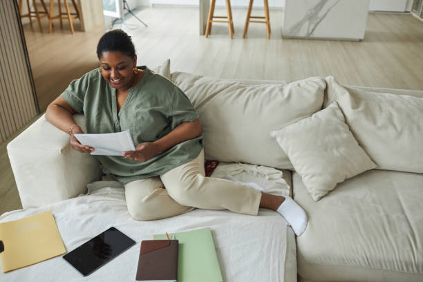 istock Woman planning her work at home 1498643052