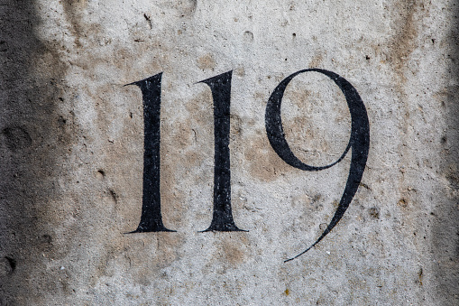 Close-up of the number 119.