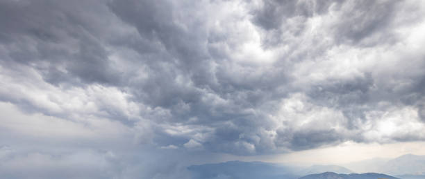 istock Heavy stormy gray clouds in the sky 1498646753