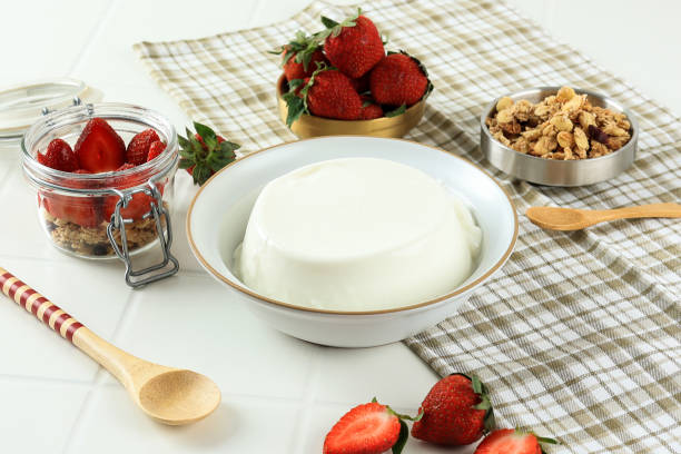 istock Yoghurt with Strawberry and Cereal, Process Making Parfait. 1498648462