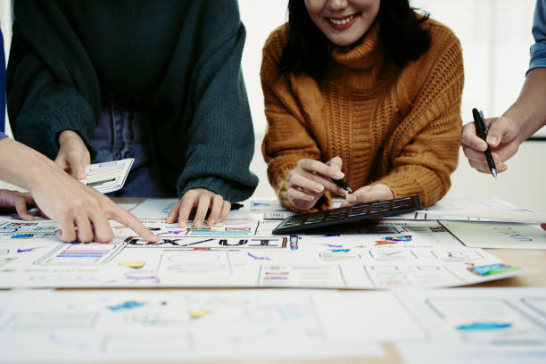 istock Team of Creative Web, Graphic Designer planning, drawing website ux ui app for mobile phone application and development template layout, process to developing prototype wireframe. 1498653154