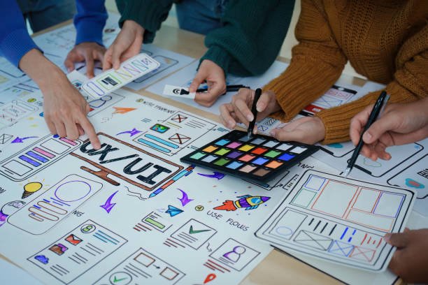 istock Team of Creative Web, Graphic Designer planning for mobile phone, drawing website ux ui app for mobile phone application and development template layout, process to developing prototype wireframe. 1498653242