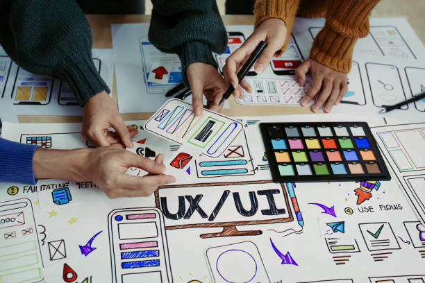 istock Team of Creative Web, Graphic Designer planning for mobile phone, drawing website ux ui app for mobile phone application and development template layout, process to developing prototype wireframe. 1498653354