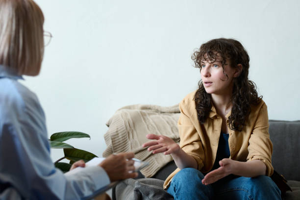 istock Woman having consultation with psychologist 1498654835