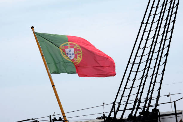 istock Portuguese flag waving in the wind in Lisbon 1498657263