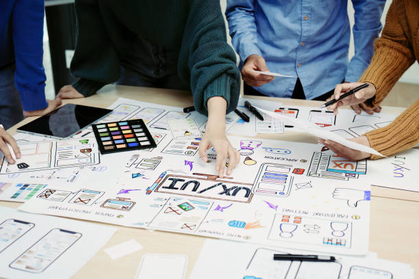 istock Team of Creative Web, Graphic Designer planning, drawing website ux ui app for mobile phone application and development template layout, process to developing prototype wireframe. 1498664759