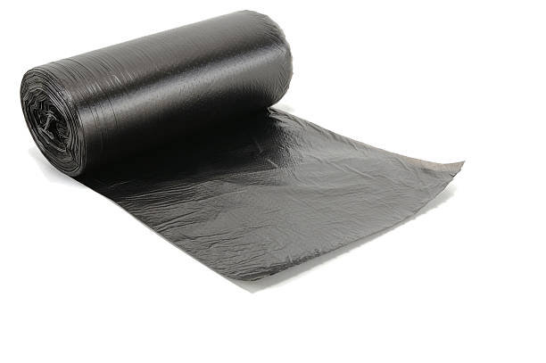 istock roll of black garbage bags 149866803