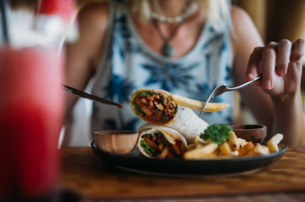 istock Tortilla wrap and potatoes served at restaurant 1498669800