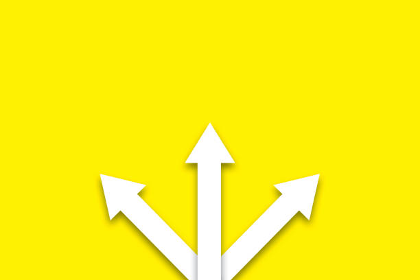 istock Three way direction white paper arrow sign on yellow background. Concept for decision, challenge, choice and direction. 1498674152