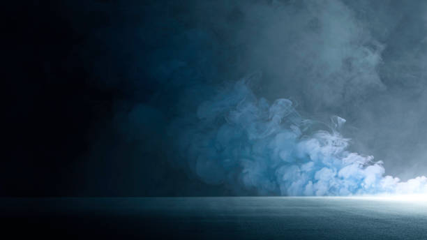 istock Smoke bombs, studio room with smoke floating up, dark empty street, dark blue background, an open dark scene, neon light, and spotlights The asphalt floor, night view, future digital technology 1498674795