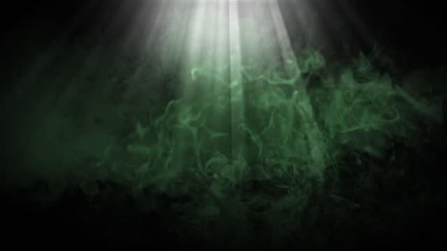 4k Smoke through light beam background