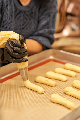 making eclairs in Bakery